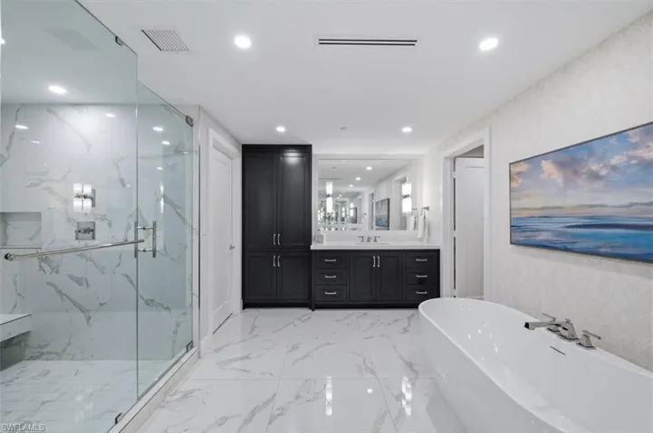 Owner's Suite Bath with Dual Vanities, Walk in Shower and Soaking Tub