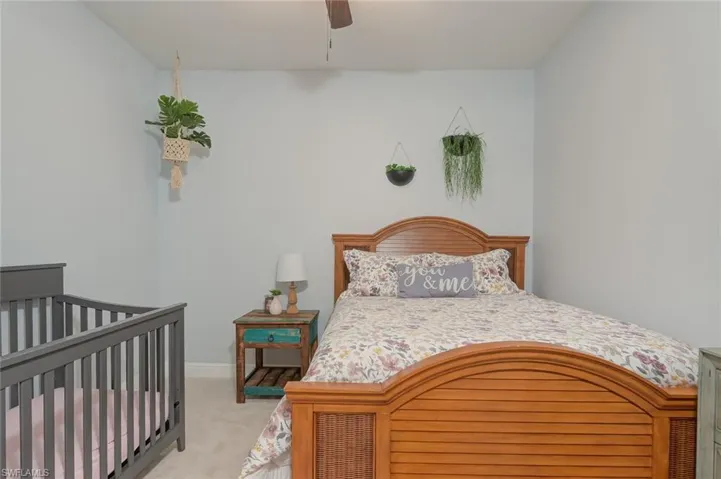 Queen bedroom with full size crib