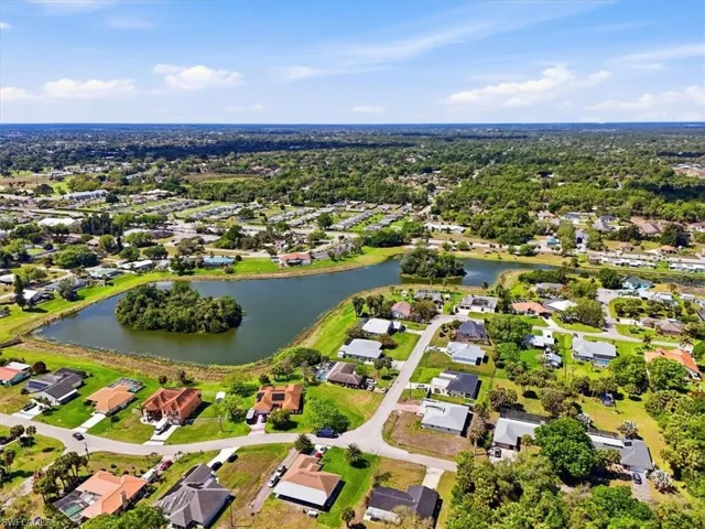 Aerial view of residential area with a nearby body of water