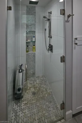 Bathroom featuring an enclosed shower
