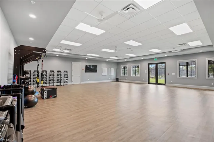 Workout room with a paneled ceiling