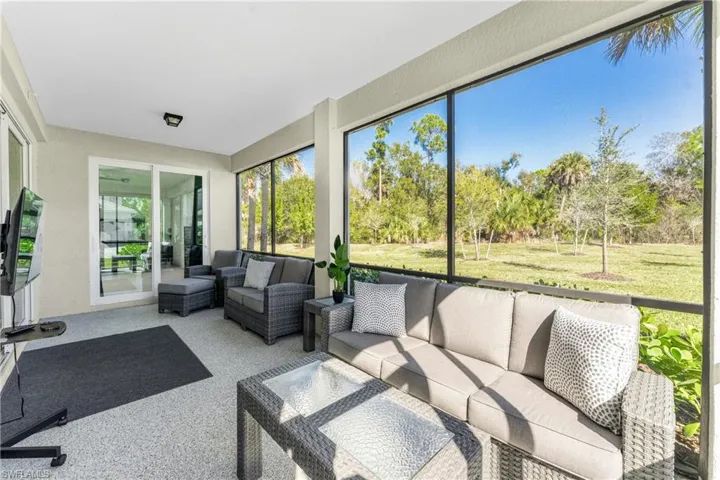 Sunroom featuring an outdoor lounge area