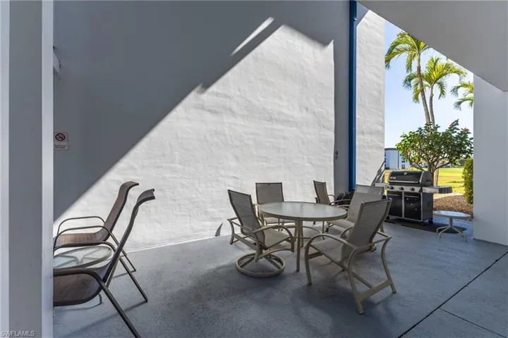 View of patio / terrace featuring a grill and outdoor dining space