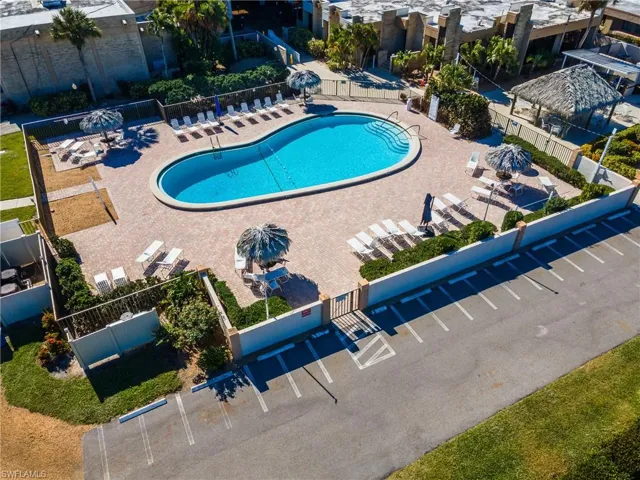 Community pool featuring a patio