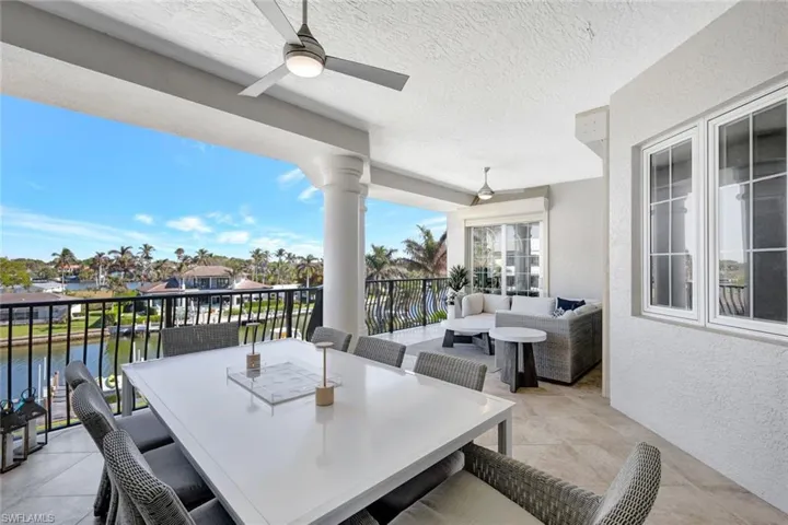 View of patio / terrace with an outdoor hangout area, a water view, and ceiling fan