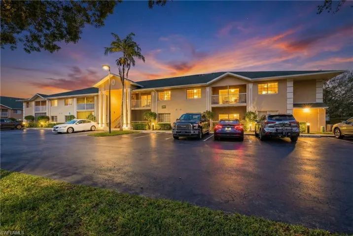 View of front of house with uncovered parking