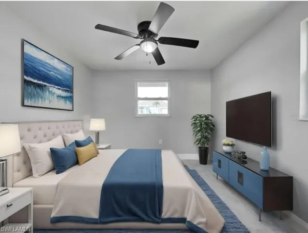 Bedroom featuring baseboards and a ceiling fan