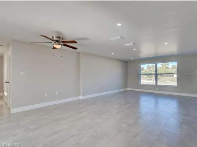 Spare room with recessed lighting and ceiling fan