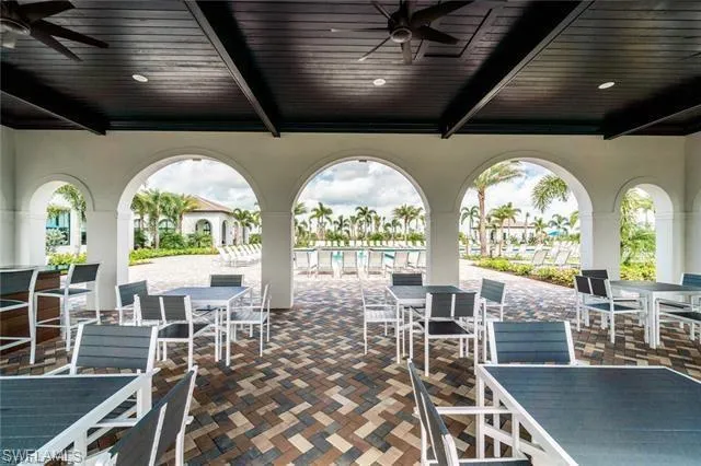 View of patio featuring a ceiling fan
