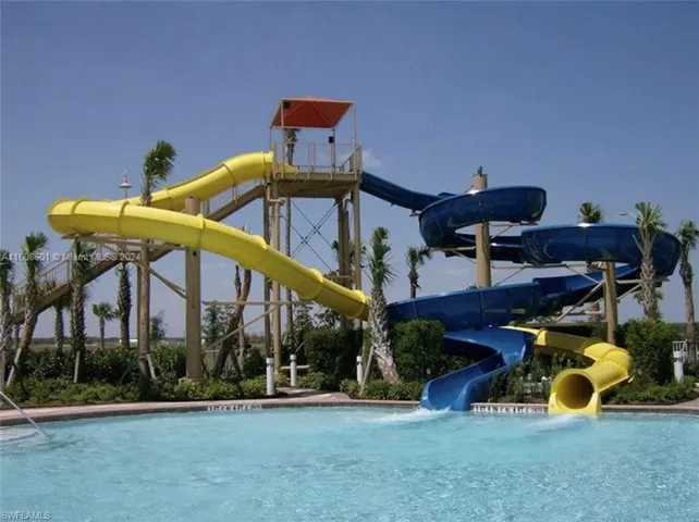 Community pool with a water slide