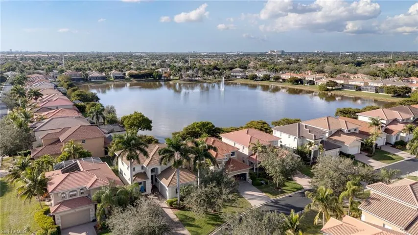 Aerial view of residential area with a large body of water