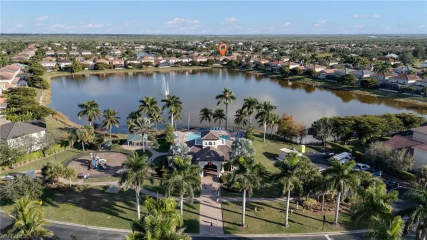 View of property location featuring nearby suburban area and a large body of water