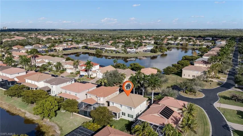 Aerial view of residential area with a nearby body of water