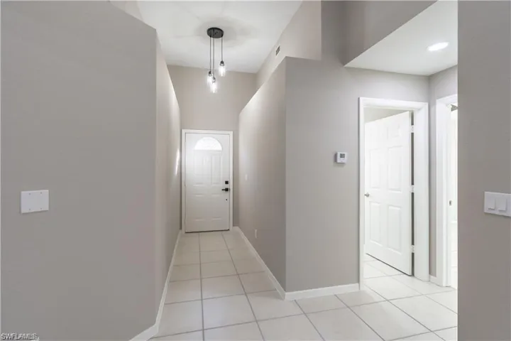 Entry Hallway, access to Guest Bathroom and Guest Bedroom