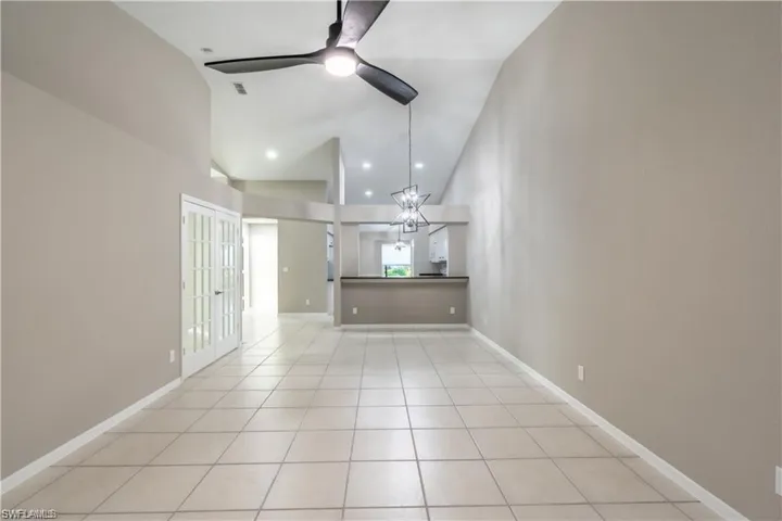 Living Room facing Kitchen and Entry Hallway