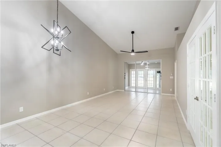 Living Room facing the Sun Room and access to outdoor Patio