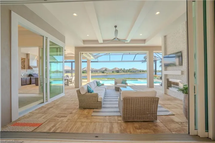 Sunroom with beamed ceiling
