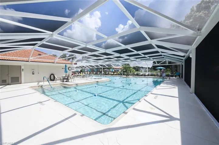 Pool featuring a lanai and a patio area
