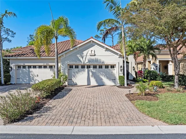 View of front of property with a garage