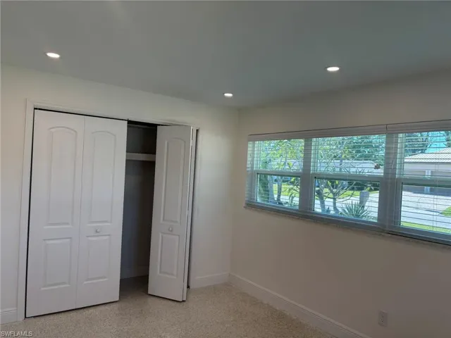 Both Guest Bedrooms feature large closets and recessed ceiling lighting.