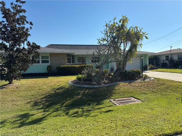 Celebrate your Holidays in this lovely, renovated POOL home in SW Cape Coral. Enjoy 3 Bedrooms, 2 Baths and a 2-car garage with Pool and Lawn care included!