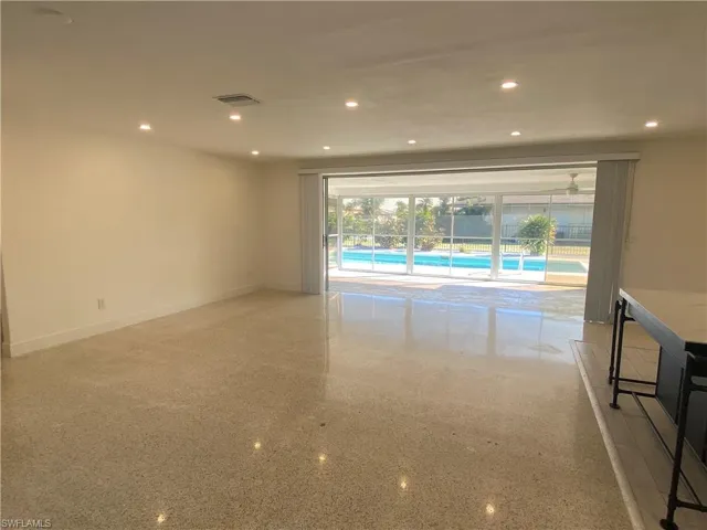 Enter into a beautiful view that continues from your living area, screened lanai, swimming pool and rear yard.