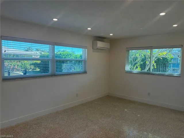 The Primary Bedroom feature polished Terrazzo flooring, recessed lighting, quality blinds and its own mini-split air conditioner for your sleeping comfort!