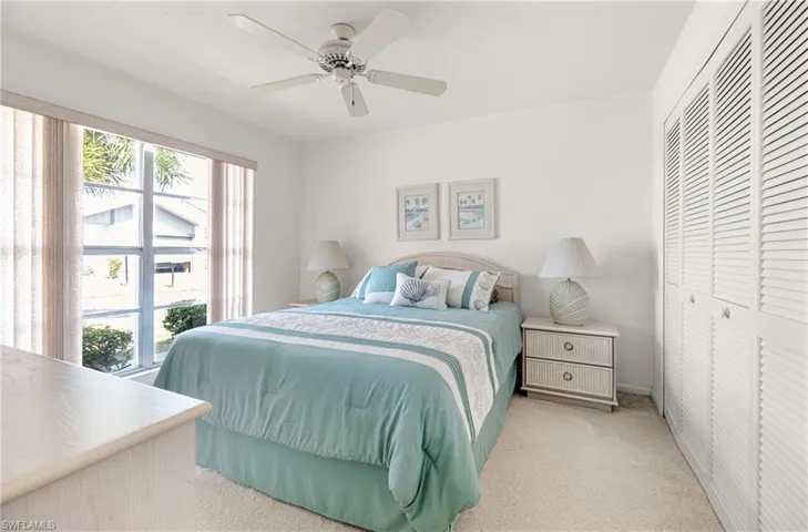 Guest Bedroom 2 with ceiling fan.