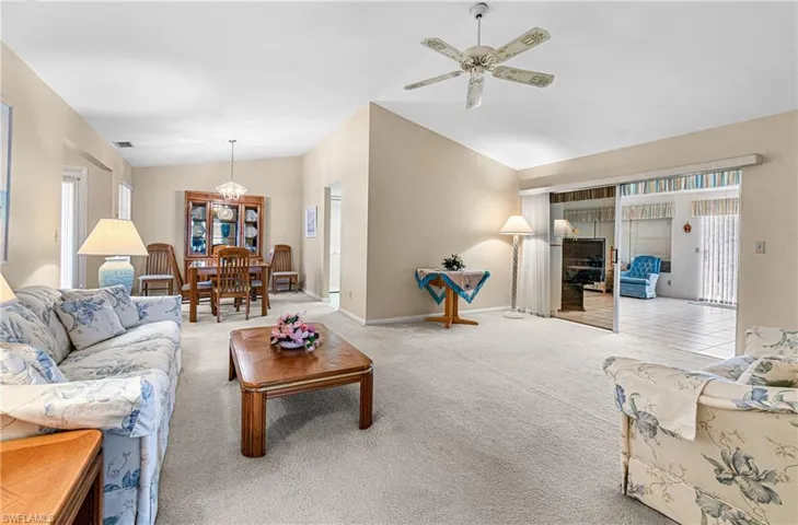 Living Room with ceiling fan.