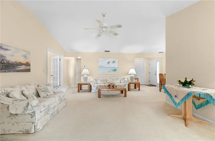 Living Room with ceiling fan.