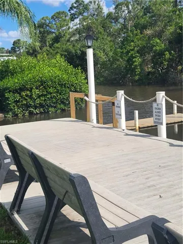 Boat dock and relaxing sitting spot with swinging bench