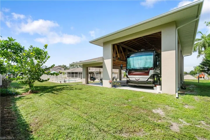 View of yard featuring a swimming pool