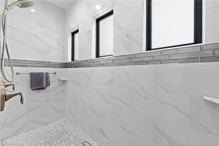Bathroom with a tile shower