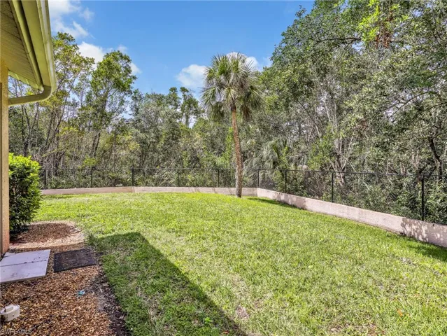 View of fenced backyard