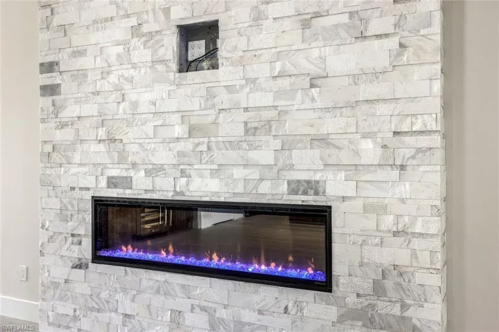 Interior details featuring a fireplace