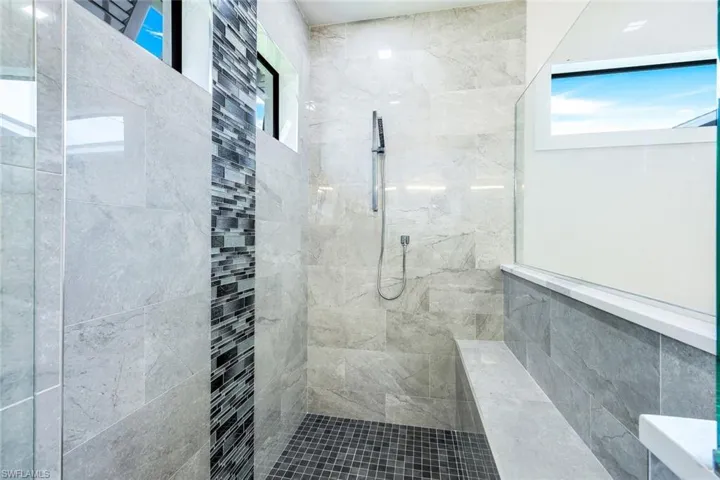 Bathroom with tiled shower