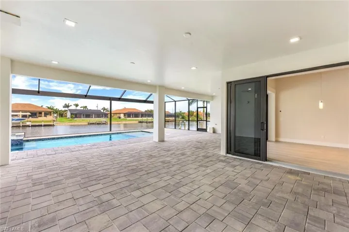 View of swimming pool with a water view