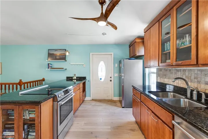 Granite Counter Tops with Wood Vinyl Floor