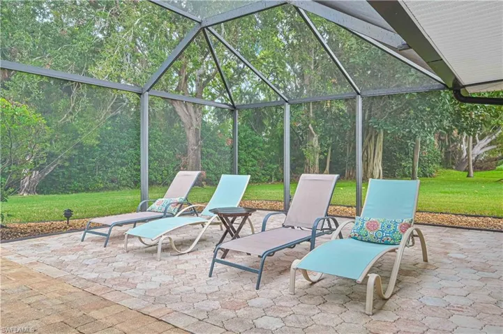 View of patio / terrace with a lanai