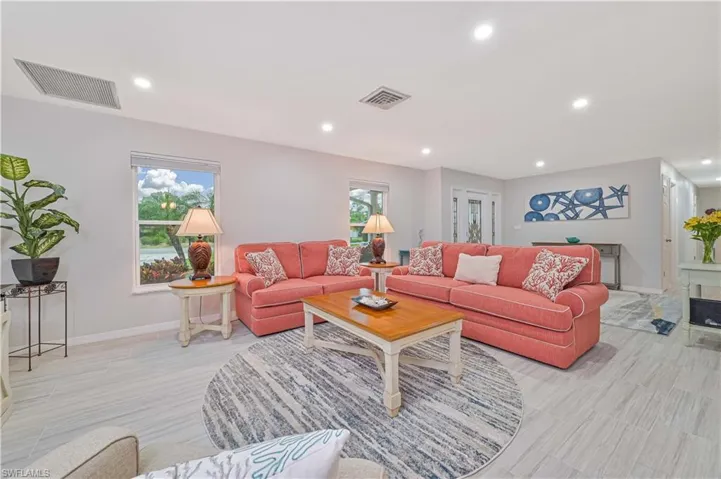 Living room featuring a wealth of natural light