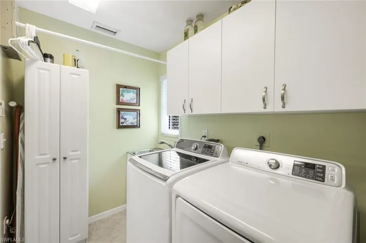 The laundry is located off the kitchen.