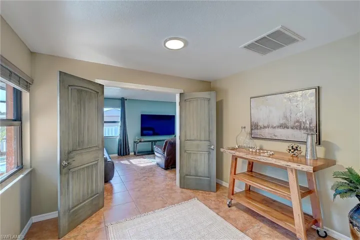 Double Door entry to bonus room or second living space