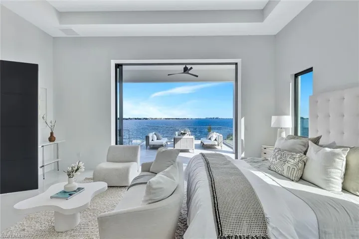 Bedroom featuring a water view