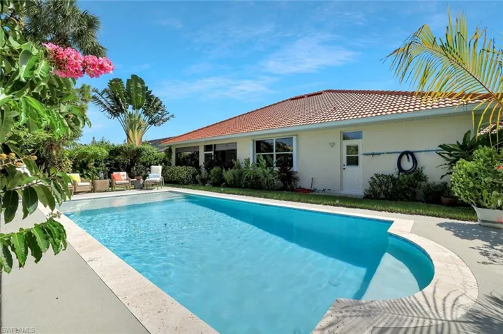 Swimming pool with a patio