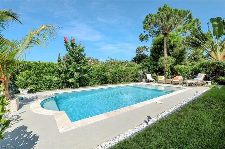 Outdoor pool featuring a patio