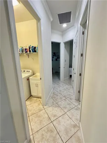 Corridor to guest bedrooms, bathroom and laundry room