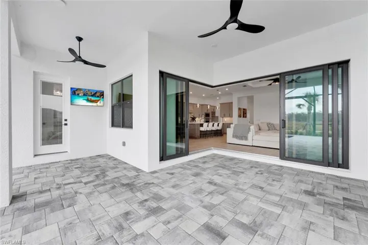 View of patio with ceiling fan