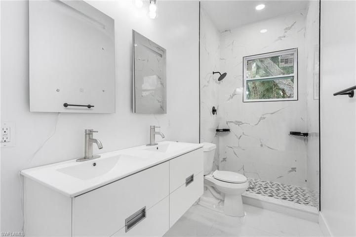 Guest Bathroom 2, a glass shower door will be added.