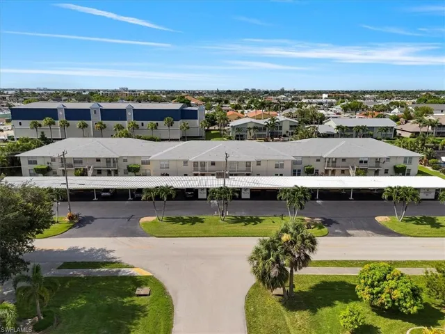 Aerial overview of property's location featuring a nearby body of water