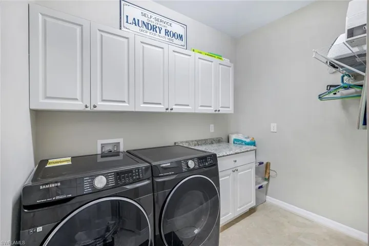 Large Laundry room with additional storage